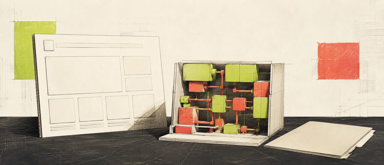 A blank cardboard website facade stands beside an open mechanical model and a plain handoff folder.